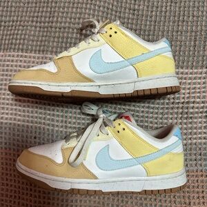 Nike Kids White, Yellow, and Blue Sneakers